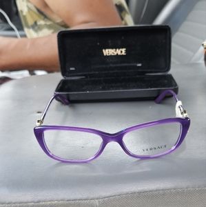 Versace eyeglasses Brand new tag still on them, purple,non prescription lenses.